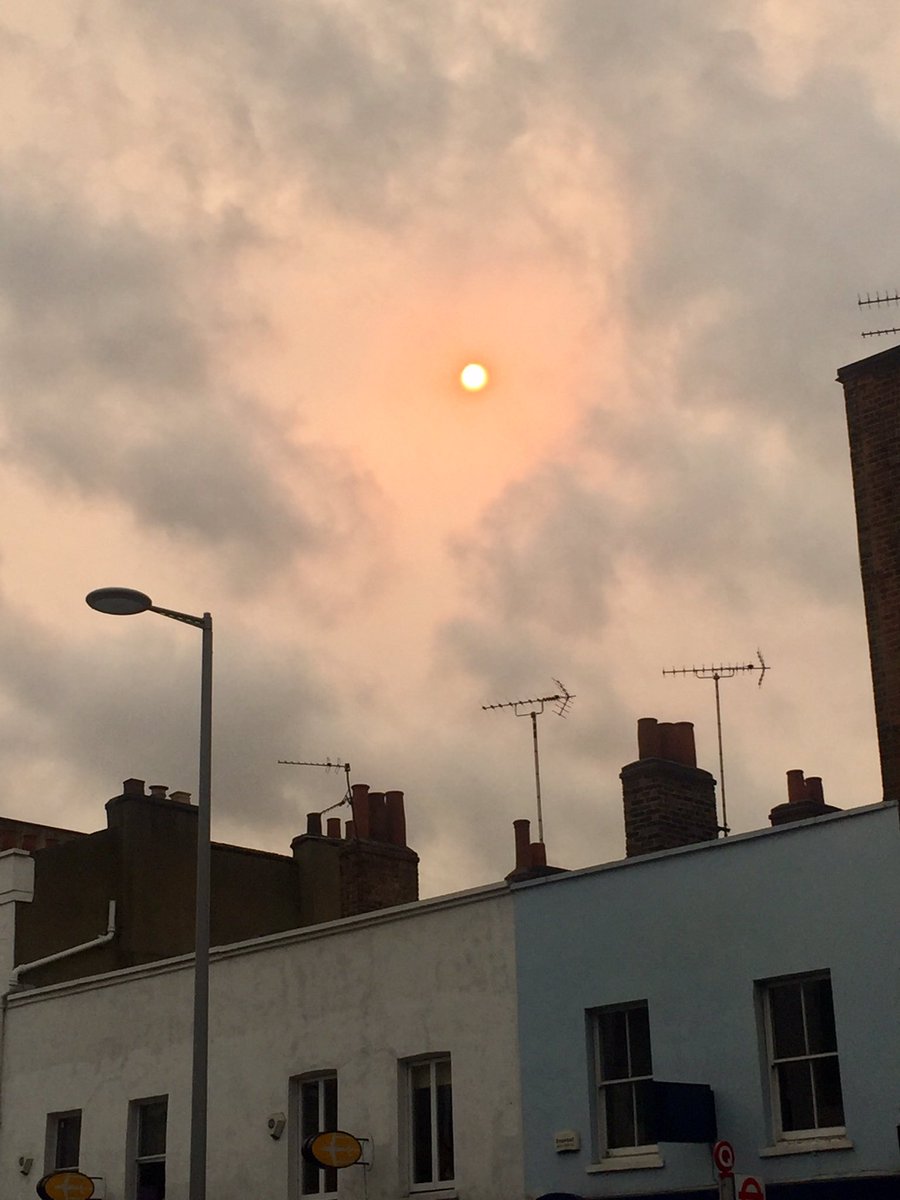 Really bizarre weather here in London today. Nearly dark before 3pm local time &amp; #RedSun due to #Ophelia bringing sand from the Sahara. 👀