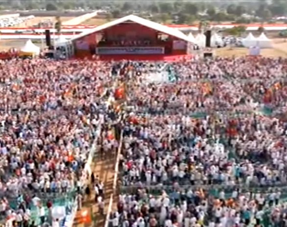 BJP4India's tweet photo. PM @narendramodi &amp; Shri @AmitShah at #GujaratGaurav Mahasammelan in Bhat Gaam, Gandhinagar. Dial 02245014501 to hear LIVE. https://t.co/tox3zeviDD