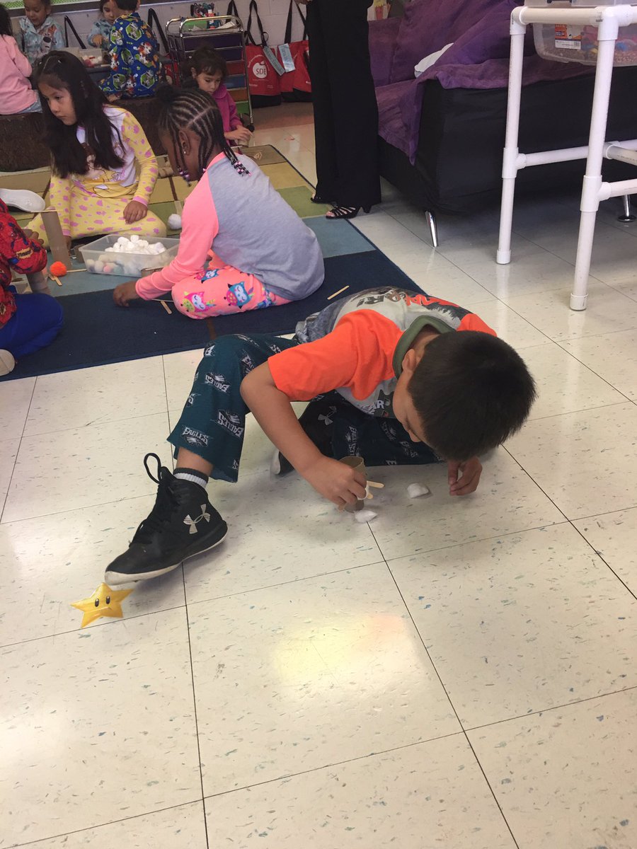 RoramaRuth's tweet photo. Timber!  Balancing apples with @christinaalai16. It's not as easy as we thought. @pamhernandez_4 @jamesburgschool https://t.co/5AWXk3Bg10