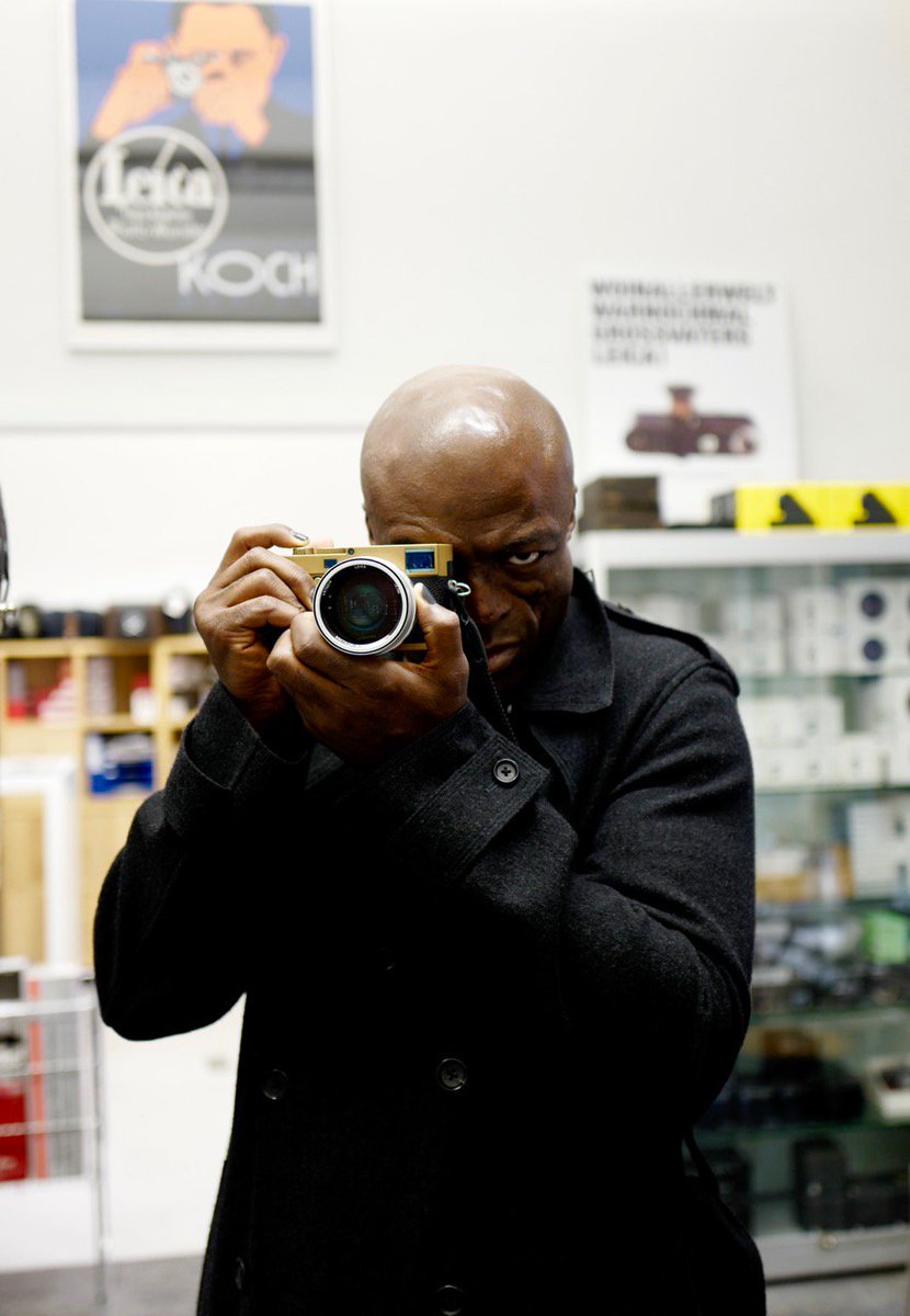 WestLichtVienna's tweet image. Der britische Sänger Seal im Leica Shop Wien #Leica #LeicaNoctilux Foto: WestLicht