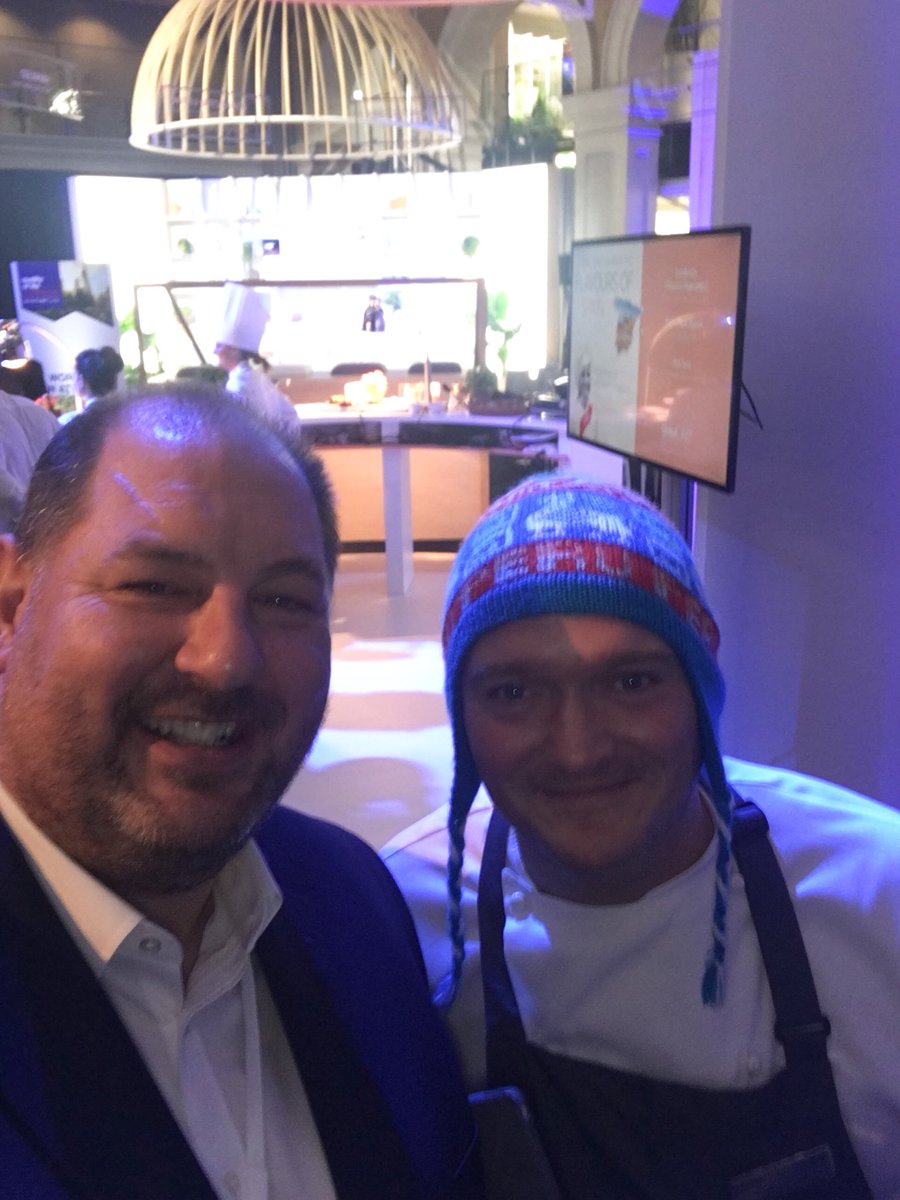 Andrew_Wilko's tweet photo. @markwetherill1 having fun serving fantastic Spanish and Peruvian food at the #sodexo #qolconference https://t.co/vR5bUHVCnb