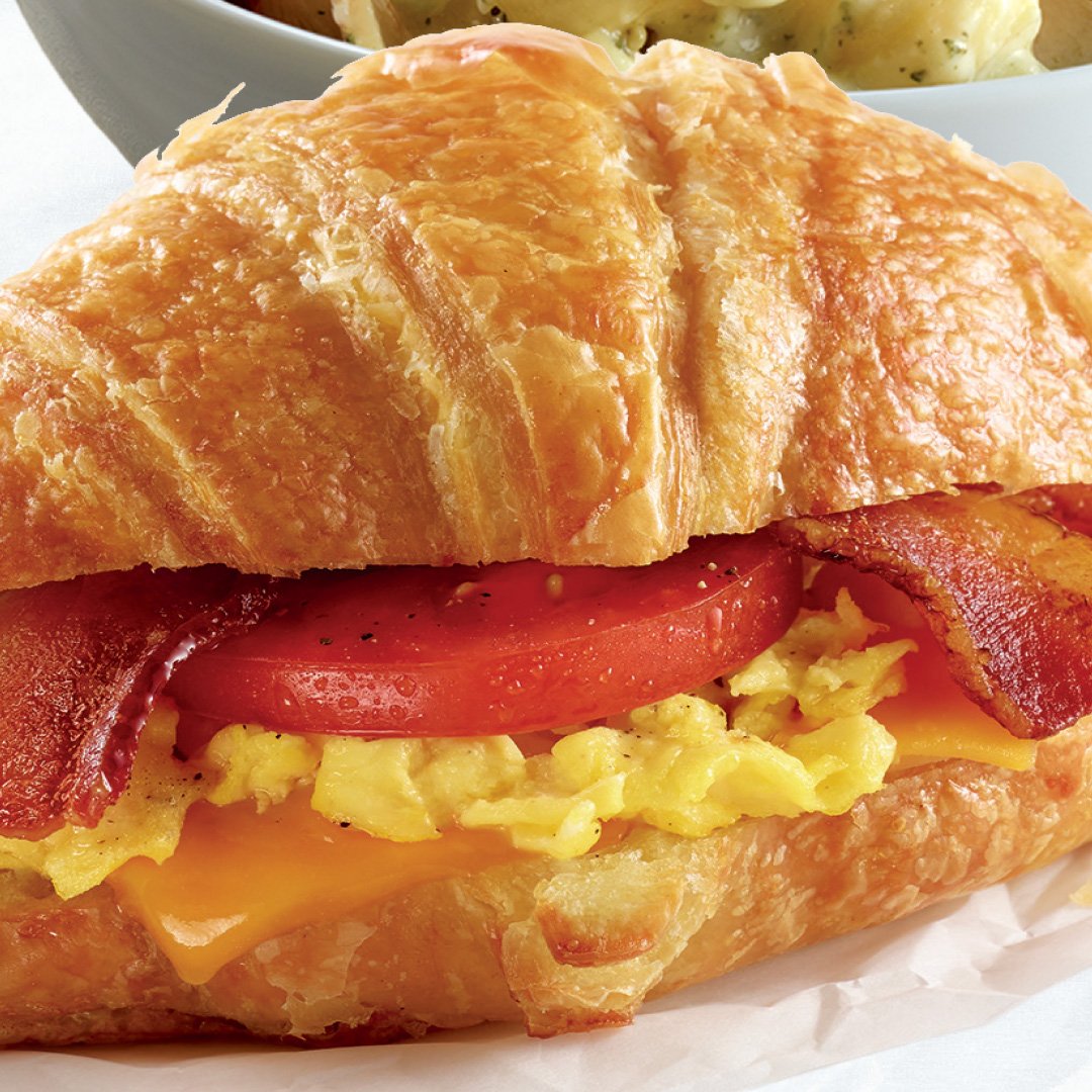 CornerBakerySFL's tweet photo. Commuter Croissant: Scrambled eggs, smoked bacon, cheddar &amp; tomatoes on a flaky croissant. Only at the Corner. #cornerbakery #croissant https://t.co/qLuhtMNutM