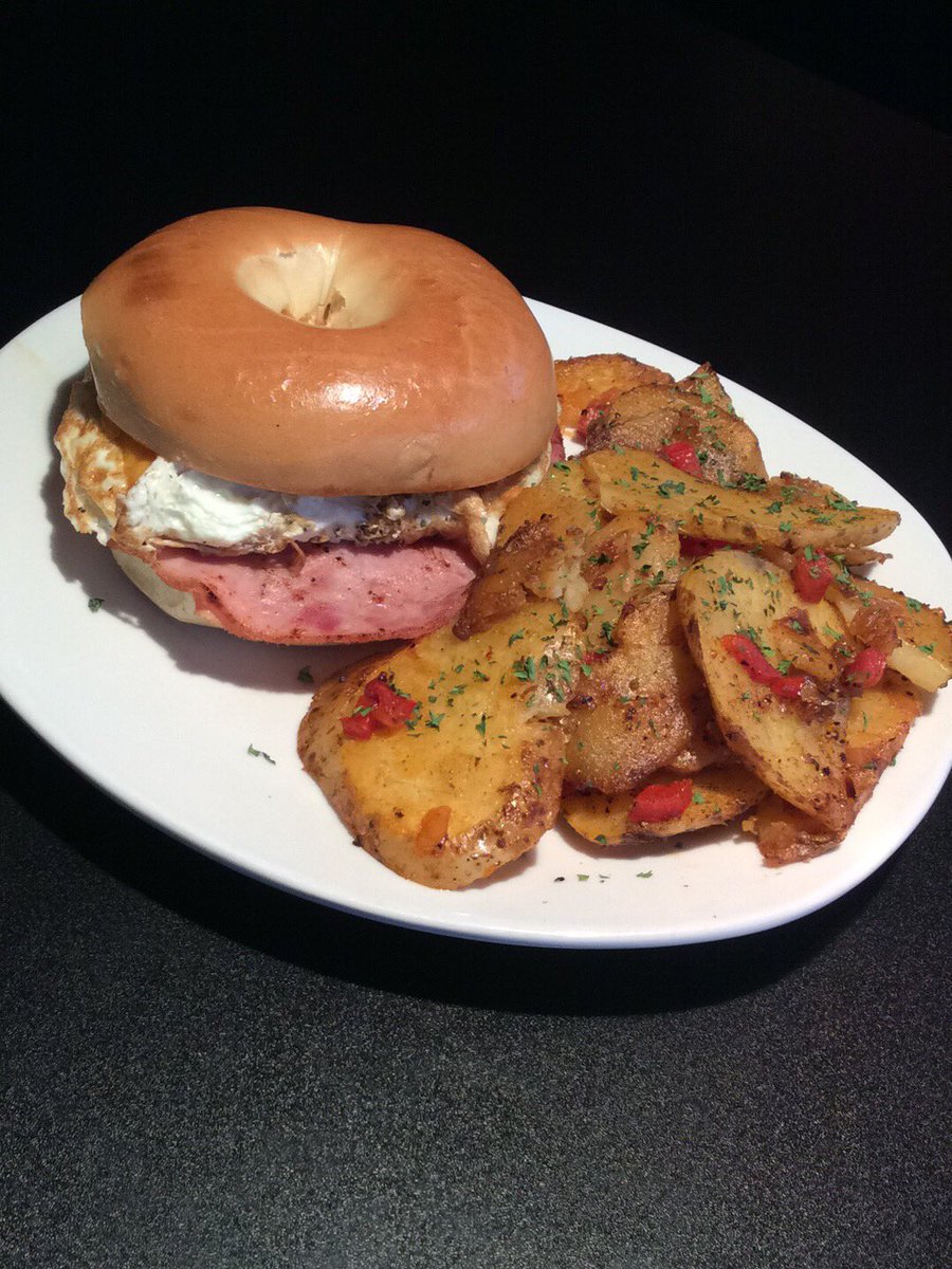 atomicgrillbbq's tweet photo. Bagelful Mornin' 
Bagel With Ham, Egg, Cheddar Cheese, Mayo, Served With Homemade Home Fries!! https://t.co/n93clxPuRx