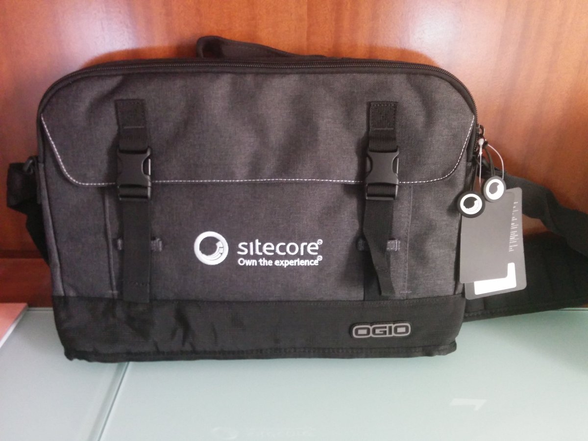 sitecoregeorge's tweet photo. The nicest swag is always from @Sitecore. Check out the zipper flair! #bagnerd #SitecoreSYM https://t.co/6s6V9zey1R