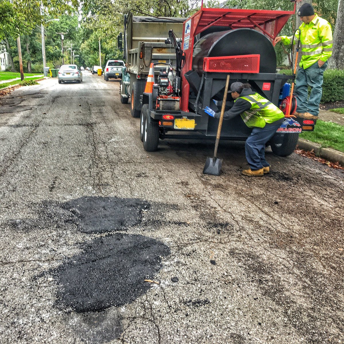 DragonAsphalt's tweet photo. We ❤️ this picture of Lakewood's DPW filling potholes using their Dragon Asphalt #Mixer to create fresh hot-mix #asphalt from just #Millings https://t.co/zdn9EJxblt