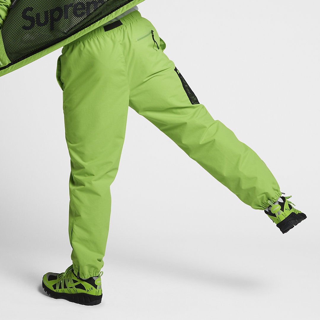 nike track pants green