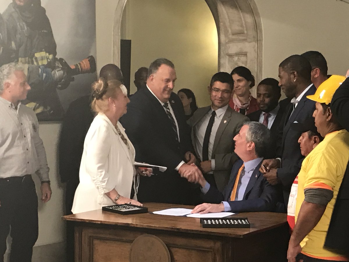 NYCBldgTrades's tweet photo. Today @NYCMayor signed #Intro1447 into law. Thanks to everyone who has helped make a #SaferNYC https://t.co/69lYoTj7ga