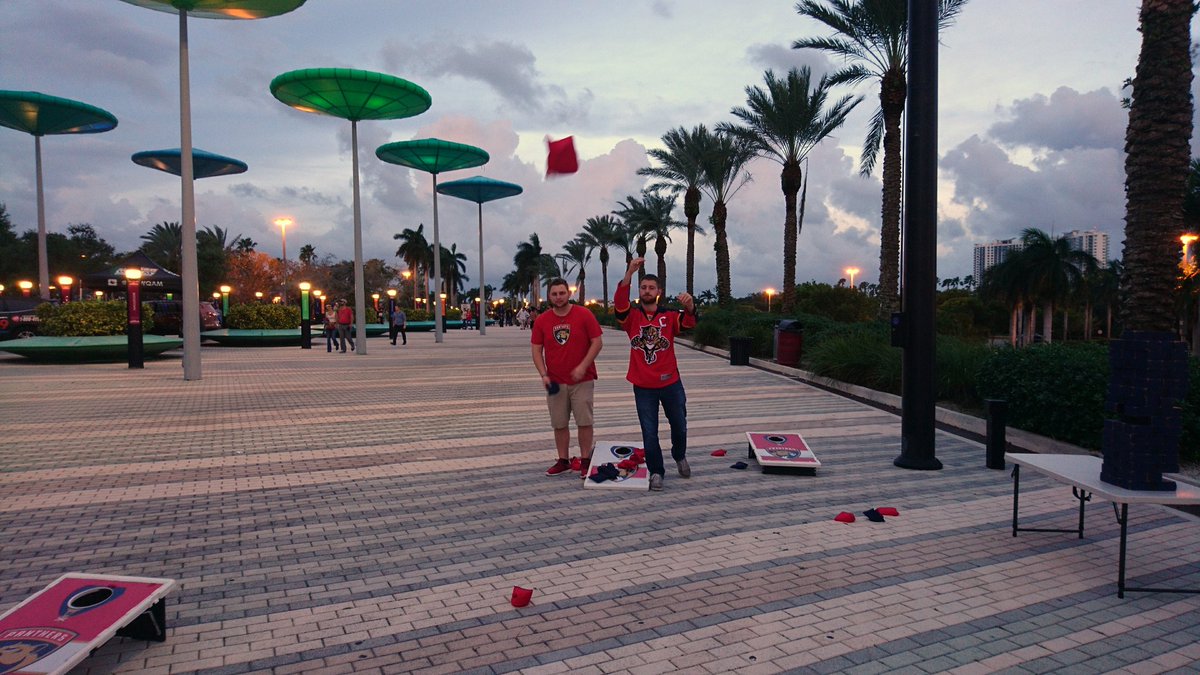 FLAPanthersGirl's tweet photo. Playing some corn hole outside @thebbtcenter on a beautiful night in sunny South Florida #FLAvsTBL #OneTerritory  @FlaPanthers  #GoCatsGo https://t.co/9GLBFkm6AP