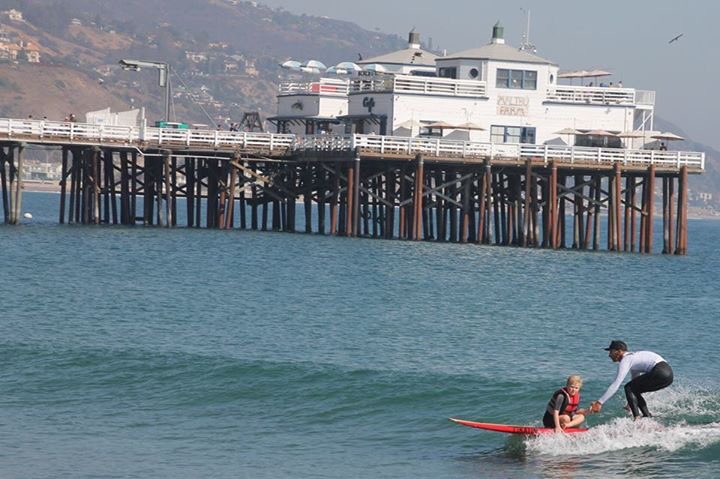 TimHortonphoto's tweet photo. It was a fun day on the beach w/ the #mightyunderdogs as they gave disabled children the rides of their lives. #Surfrider #malibu https://t.co/HjUXsTUDDW
