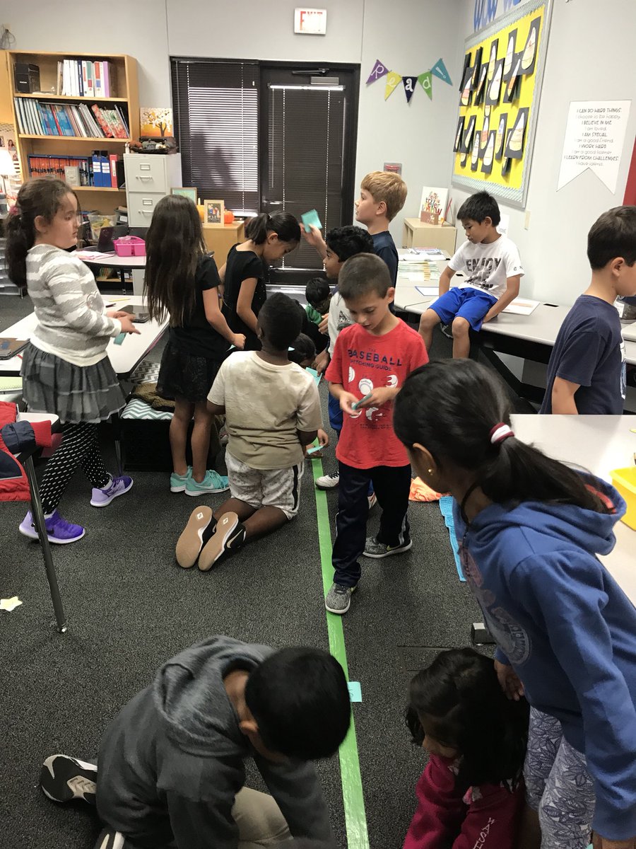 HeatonMubeen's tweet photo. Team work makes a dream work! Hands-on learning with number lines &amp; comparing numbers. So engaging! #HuskyPride @HaunElem https://t.co/pRhuC7egHB