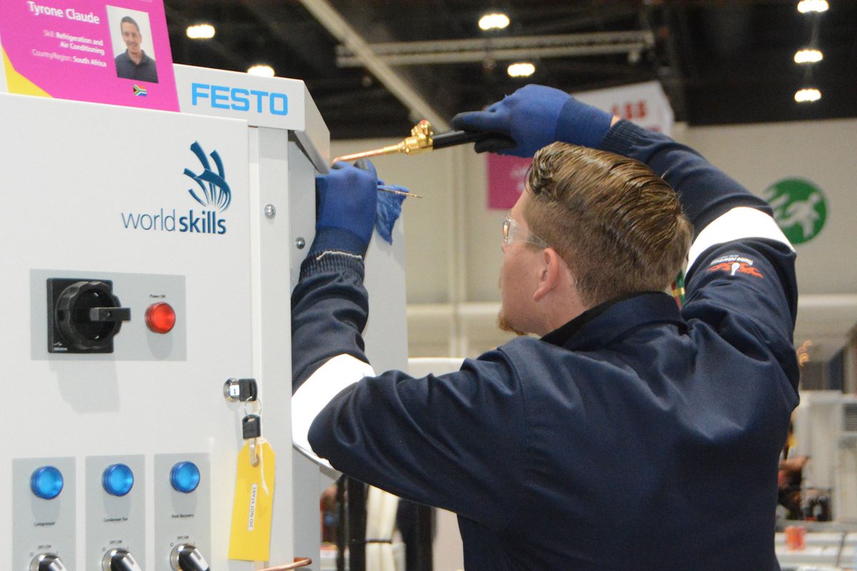 HigherEduGovZA's tweet photo. Tyrone Bunce (South Africa's Refrigeration and Air Conditioning Competitor) in action on Day 2 of the World Skills Competition at the ADNEC in Abu Dhabi. #SkillsRuleTheWorld #WS_AbuDhabi #WorldSkillsZA https://t.co/AdRbb46JZJ