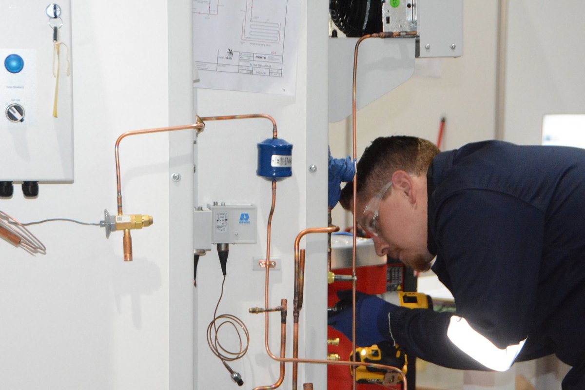 HigherEduGovZA's tweet photo. Tyrone Bunce (South Africa's Refrigeration and Air Conditioning Competitor) in action on Day 2 of the World Skills Competition at the ADNEC in Abu Dhabi. #SkillsRuleTheWorld #WS_AbuDhabi #WorldSkillsZA https://t.co/AdRbb46JZJ