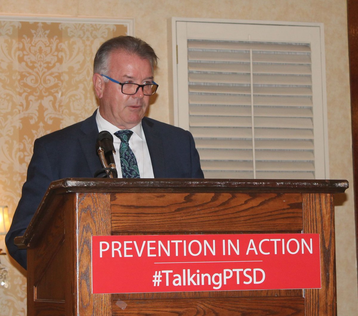 ONTatwork's tweet photo. Ontario Minister of Labour Kevin Flynn addresses the crowd #TalkingPTSD https://t.co/ozLkmZ2BG1