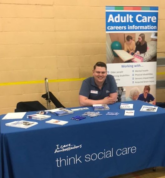 NSCSLtd's tweet photo. I Care...Ambassador Chris (@TheraTrust) set to promote care careers, alongside health colleagues at @sprowstonhigh @BeaconEast1 Careers Fair https://t.co/tw9AjMxNVX