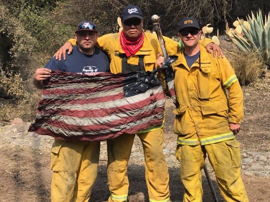 1FootInTheBlack's tweet photo. "#Nevergivein, #neversurrender, Never allow despair to overcome your spirit." San Fran FD finds #AmericanFlag in fires "Battered but Strong" https://t.co/4a5yyGOwOu