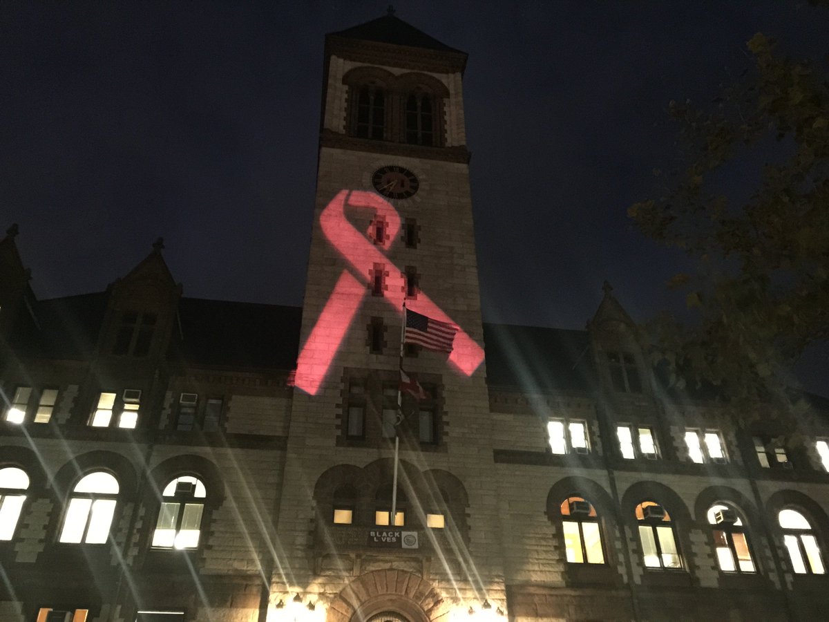 KomenNewEng's tweet photo. Last night @rCamCityHall lit up pink for #BreastCancerAwareness Month. TY @E_DeniseSimmons for hosting the event! #BeMoreThanPink #KomenNE https://t.co/G9b0Lzk1Tx