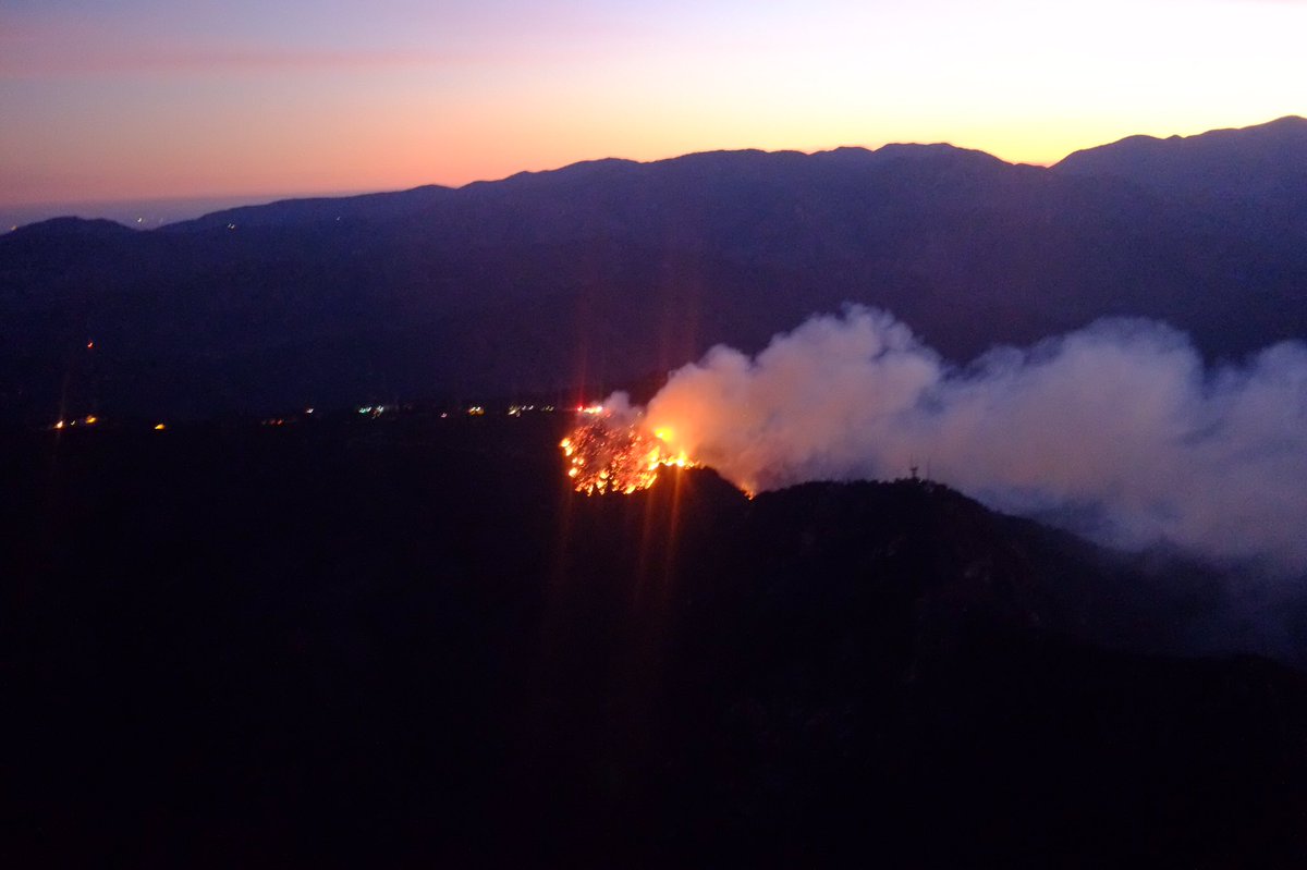 scottburtknx's tweet photo. Brush Fire Mount Wilson.  The good news, at least from my vantage point, it hasn't grown too much.  Light Winds. @KNX1070 #KNXEYEINTHESKY https://t.co/0qR4D6SaPA