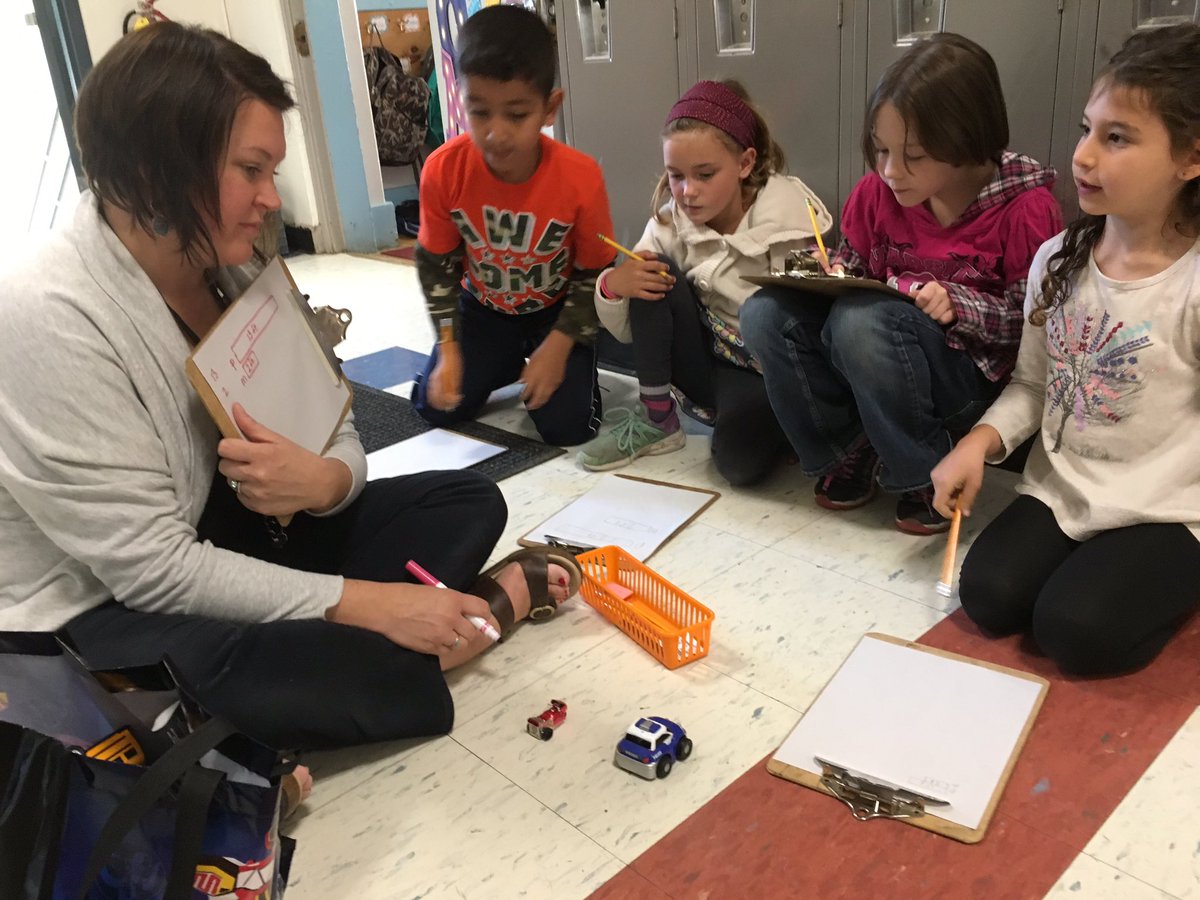 2nd graders reinforcing skills in a practical use for math