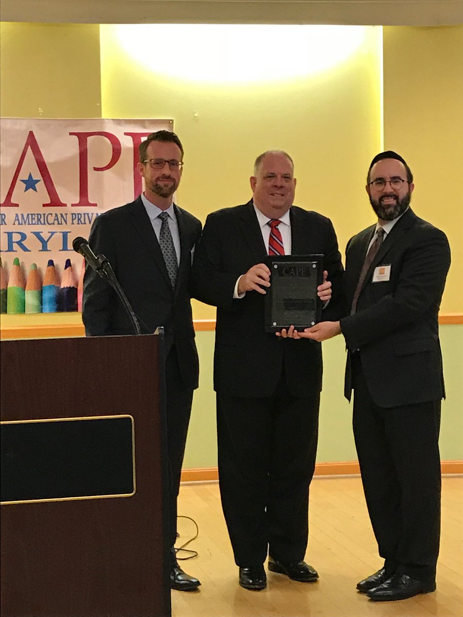 <a href="/LarryHogan/">Larry Hogan</a> accepting the 2017 Champion of Education Award from <a href="/MD_CAPE/">Maryland CAPE</a> <a href="/StAmbroseChev/">St Ambrose Cheverly</a>