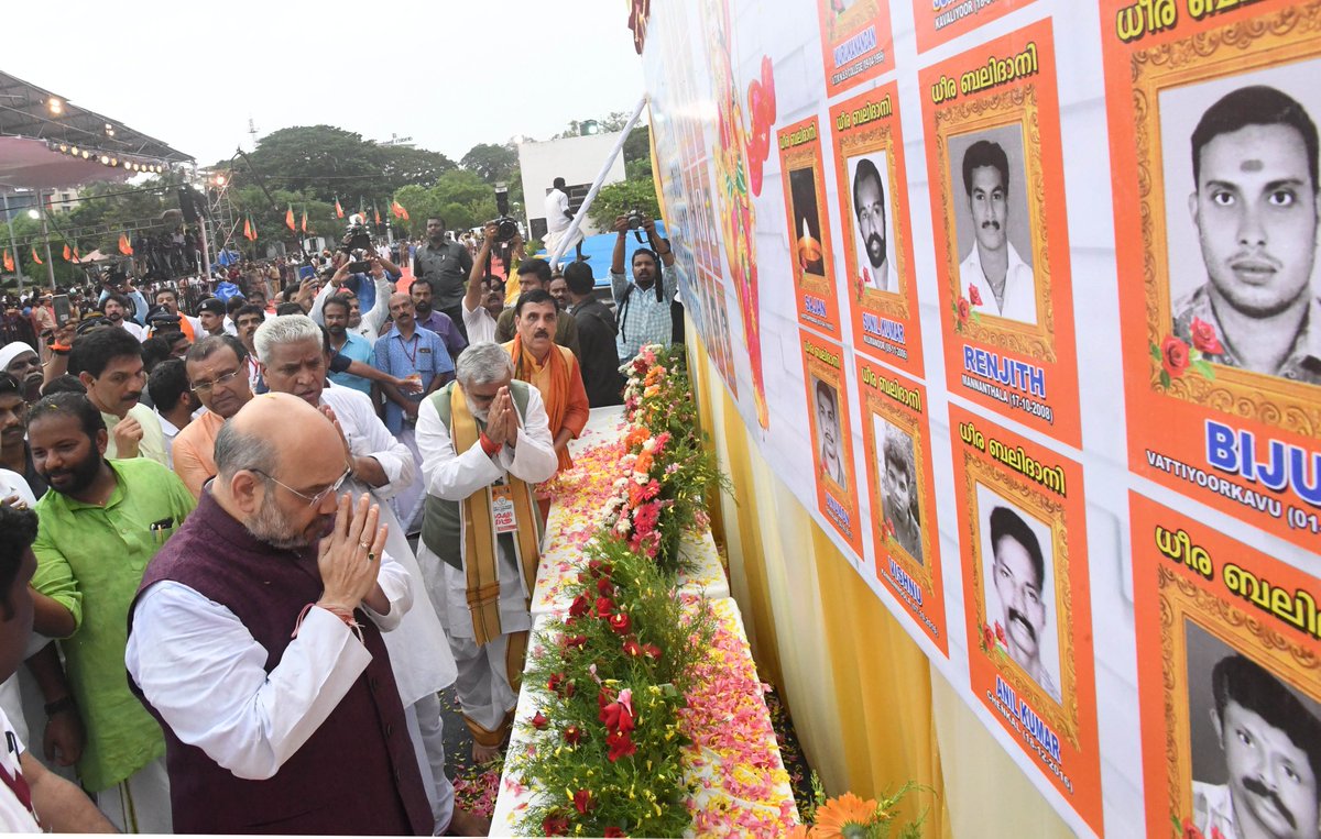 AmitShah's tweet photo. Paid tributes to the martyrs who sacrificed their lives for party &amp; ideology. I want to assure that their sacrifice will not go in vain. https://t.co/rUR7ASuZDC