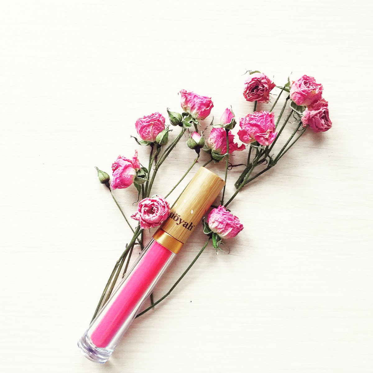 This all natural lip gloss is much healthier than its name suggests, so brighten up with Pink Frosting! #naturallip #prettyinpink