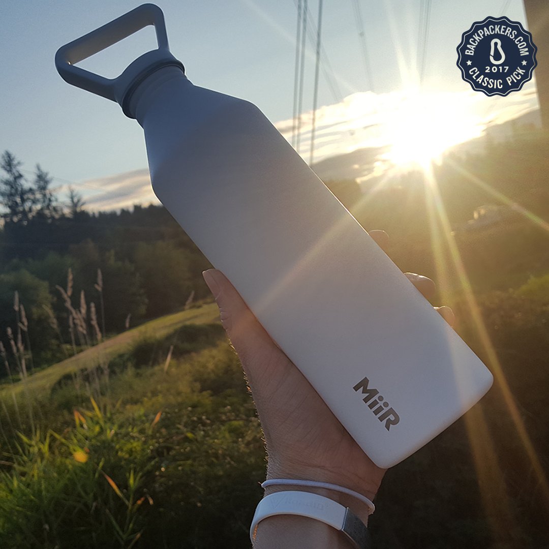 BackpackersCom's tweet photo. We've awarded the @miir 27oz #waterbottle as the #ClassicPick for the #UrbanHiker. Read the full review! https://t.co/Fdm0OSL59l https://t.co/EQFB27lAe8