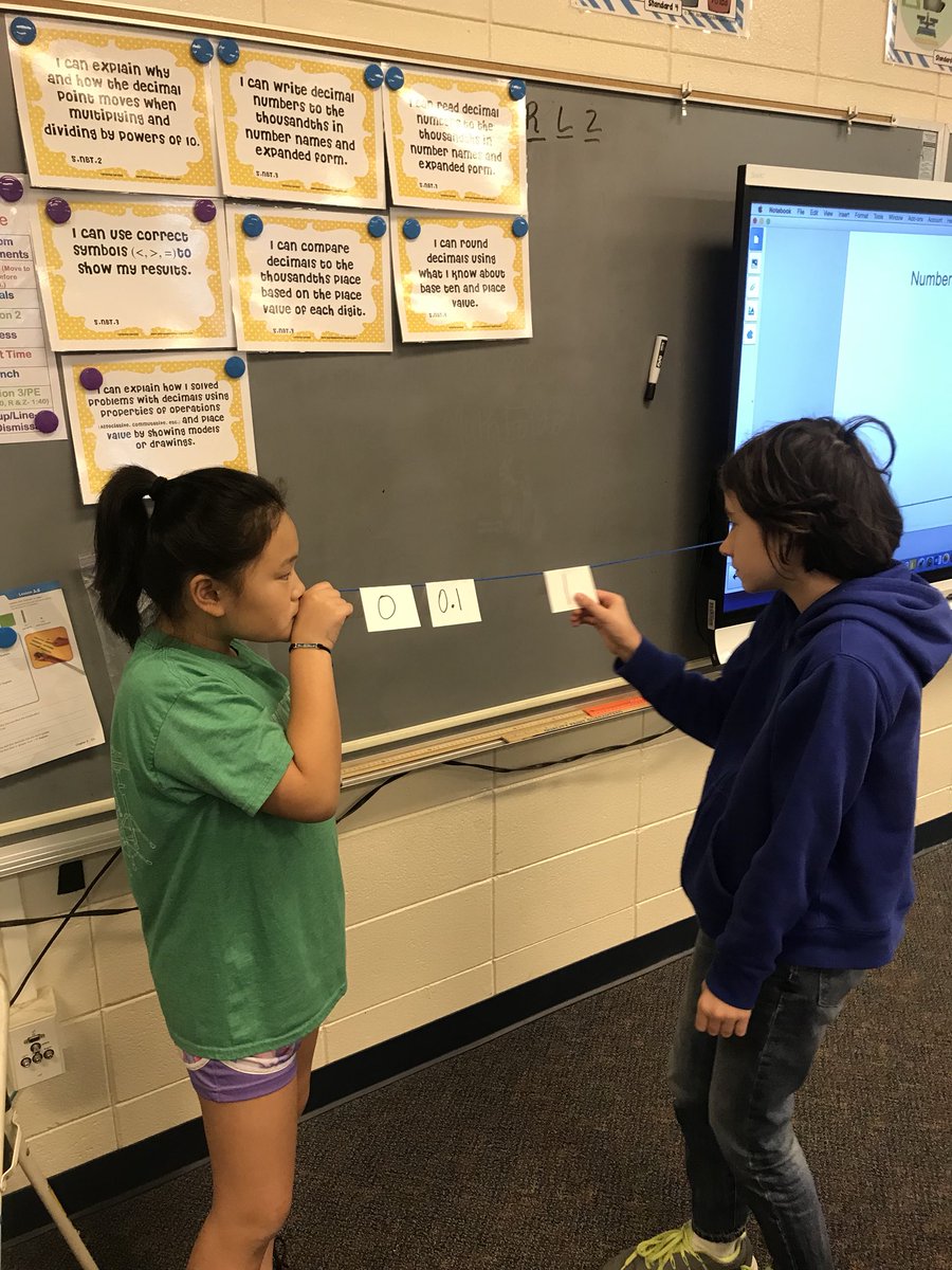 LauraRubin65's tweet photo. Students engaged while trying  out Wes Gordan’s number line activity during a decimal pace value unit! #yarbroughknights #CelebrateAuburn https://t.co/kkRvDWF80u