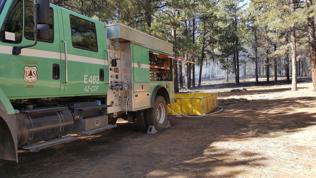 CoconinoNF's tweet photo. Field trip to #BillFire north of Wing Mountain (contained, 3 acres) to chat with NAZ Today about abandoned campfires. #Flagstaff @naztoday https://t.co/iHYNssglyM
