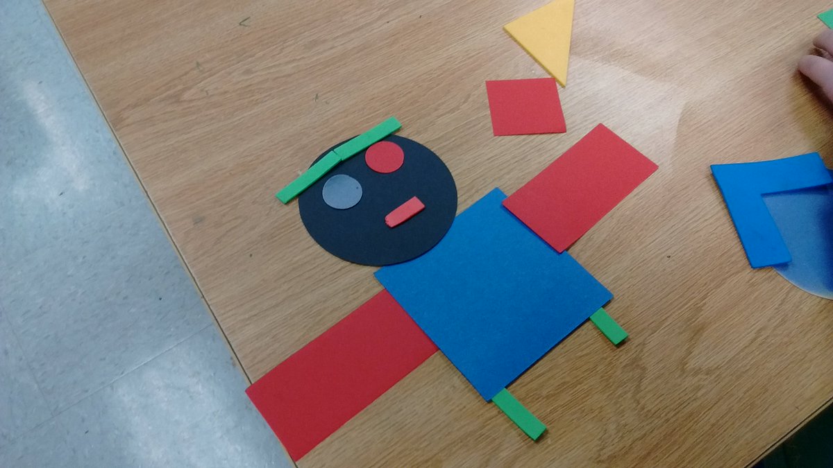 Kinders moving onto shape! We tried making things out of shapes with manipulatives today #HMS116 #boy #robot #Imadeyoumsski #cat