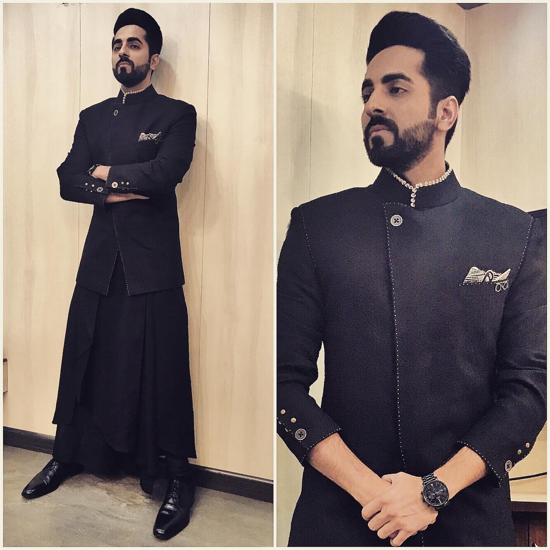 Regal and imperial. <a href="/ayushmannk/">Ayushmann Khurrana</a> rules over the darkest hue of life. 
Style by <a href="/ishabhansali_/">Isha</a> Dressed  for #KaunBanegaCrorepati  
<a href="/SrBachchan/">Amitabh Bachchan</a>