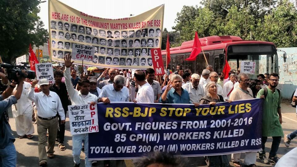 dheerajik's tweet photo. The march is being taken out by the Party against the killing of CPI(M) activists by the RSS-BJP goons in Kerala. https://t.co/tiDEDz679E