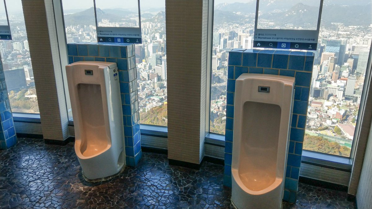 tomfaull's tweet photo. Having a #pee at 774ft above #Seoul #SouthKorea #urinalview https://t.co/vWlqukdXub
