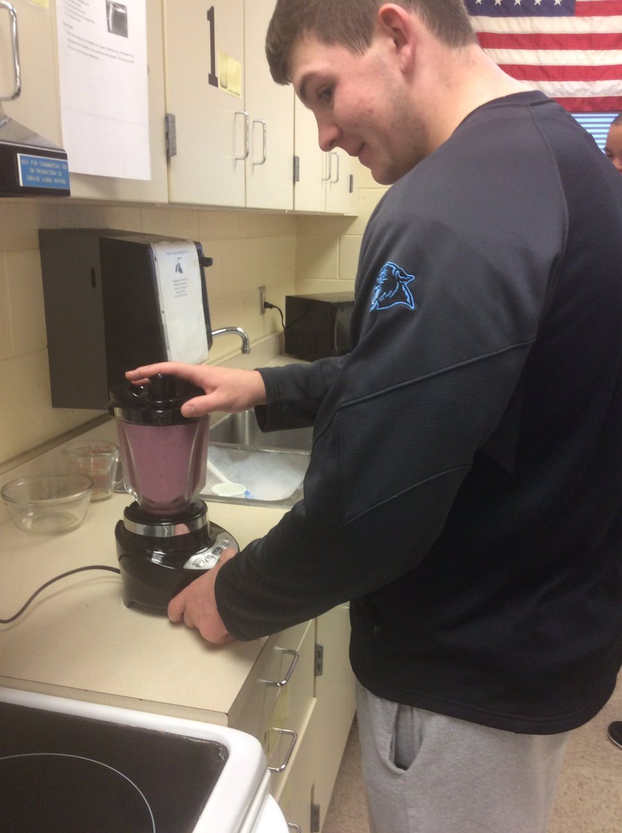 Checking out the vitamins and minerals found in our smoothies! 🍓🍌🥝🍍