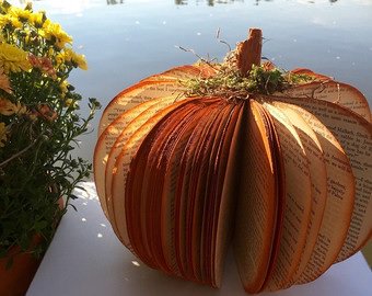 LibraryatHHS's tweet photo. What to do w/old library books? Repurpose & make a pumpkin! Lunchtime wkshps continue in Makerspace. @HHSBears @Makerspaces_com #repurpose https://t.co/IdaAqtq29d