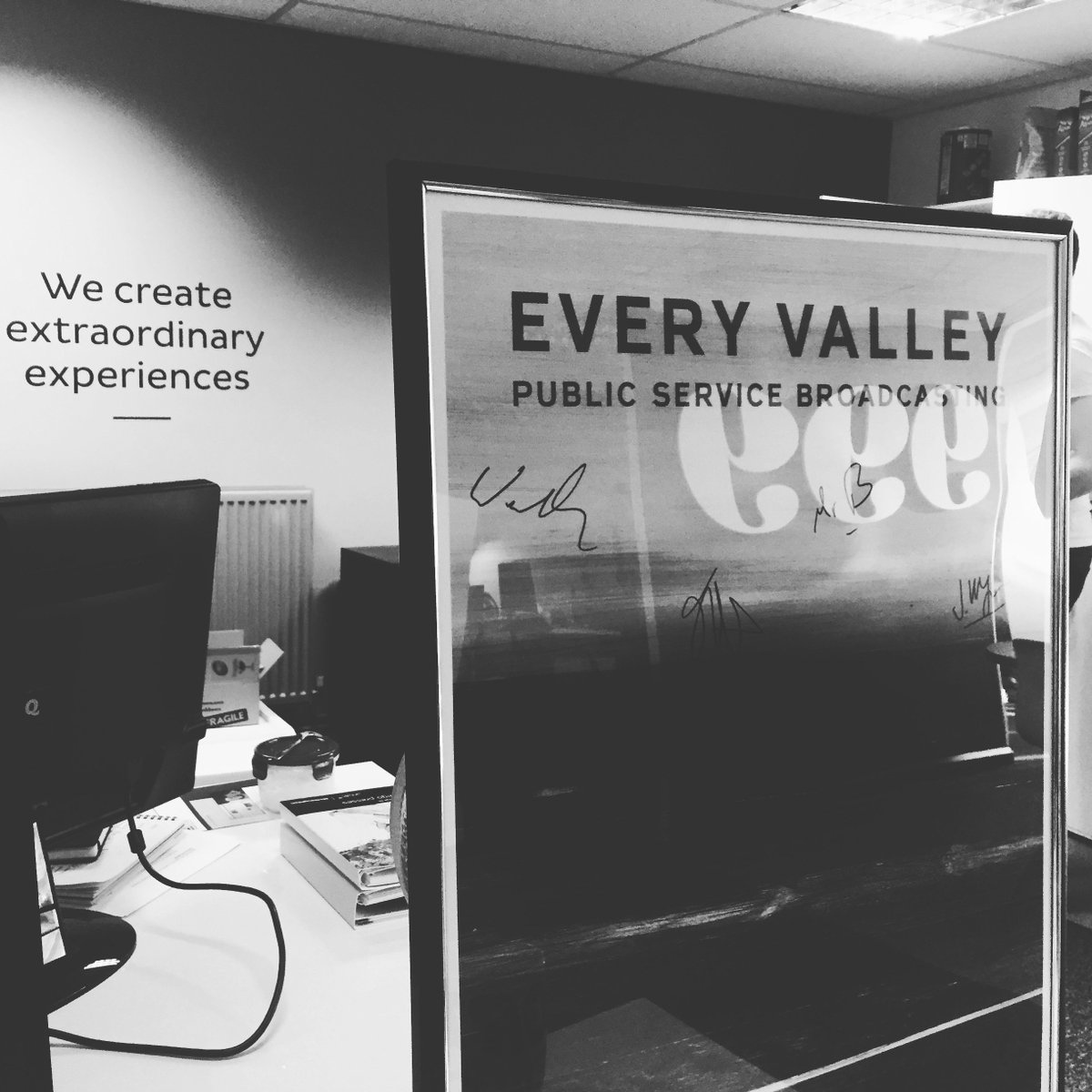 999design's tweet photo. What's this? Public Service Broadcasting (signed poster) is in the house! Thanks to Paul for donating his merch to the new 999 shelves :) https://t.co/RhitqxtTIH