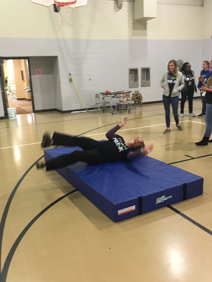 RCS_Director's tweet photo. Brenda teaching kids to Stop Drop and Roll at today's PreK Safety Fair https://t.co/4kWqh5ZU5D