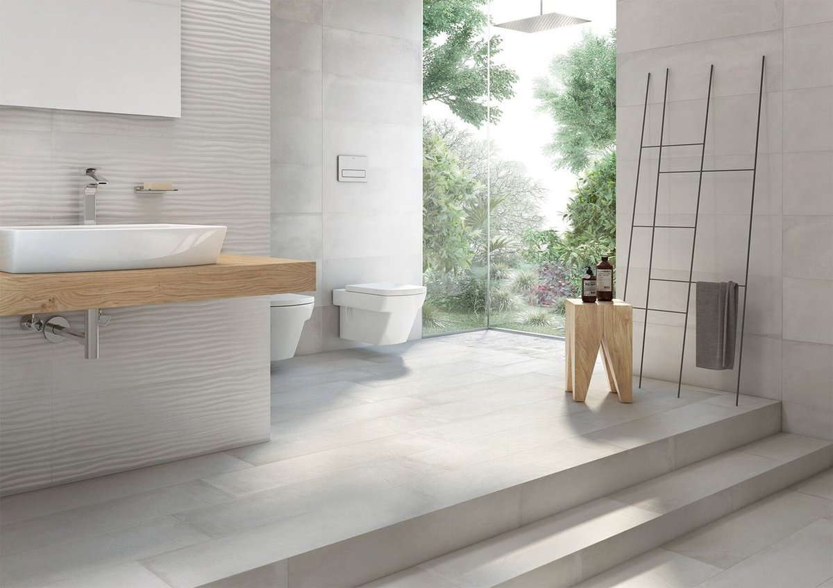 rocatileusa's tweet photo. Using neutral tiled walls and playing with furniture as accents is a winning combo! Create your perfect space with our #ChelseaCollection https://t.co/vw0lzCU2sU