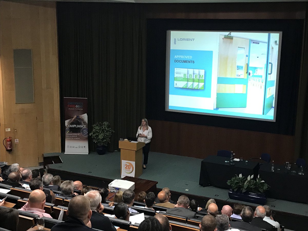 CheckmateFire's tweet photo. We enjoy a presentation at the #BRE_Conf with Sarah Lewis from @LorientUK delivering a great #cpdseminar on #firedoorseals! #Checkmatefire https://t.co/VPwLOwncPH