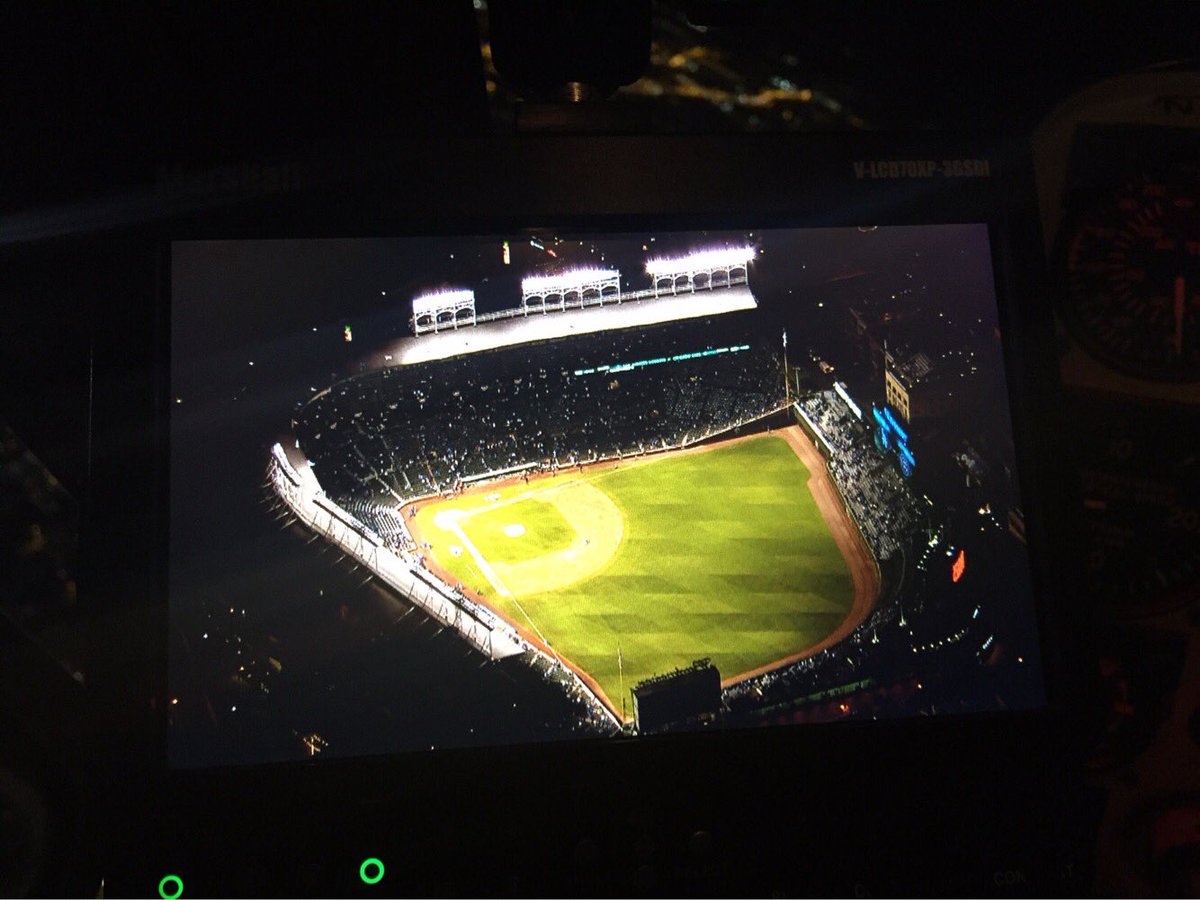 AerialPilot's tweet photo. It's that time of year again! Over Wrigley last night for #MLB LA Dodgers at Chicago Cubs Game 3 #TBS! Cockpit monitor + 📺 by @WineWoman! https://t.co/xpjuYSrPUL