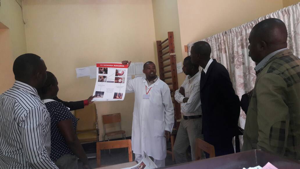 CureRwanda's tweet photo. The clinic coordinator of Kabgayi explaining to the visitor on Clubfoot and Ponseti Method during DistrictVisit. @Bernuza14 @HabyarimJean https://t.co/0LtbyNMzpq