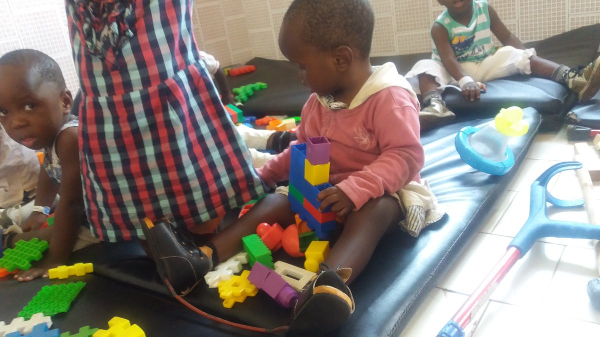 CureRwanda's tweet photo. It's wonderful when my #ClubfootShoe become familiar with my Toys. Our clinic in Rilima has all to make children feel comfortable. https://t.co/EFkgr0fcFn