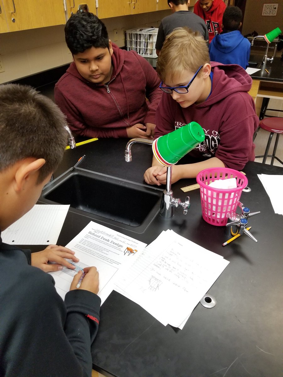 1ClintWilson's tweet photo. Students in @BethRivas22 class working through the engineering design process as they create a new student desk. #TSCStem #TSCSchools https://t.co/Za1hDarJq2
