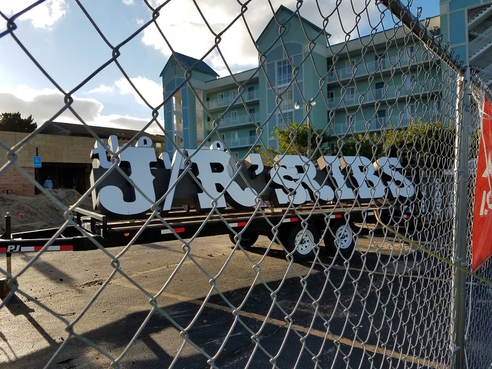 OCFun's tweet photo. Aww, JR's no more!  Check out their famous sign, now sitting on a trailer, ready to be taken away. https://t.co/ZnIXMbWLuw