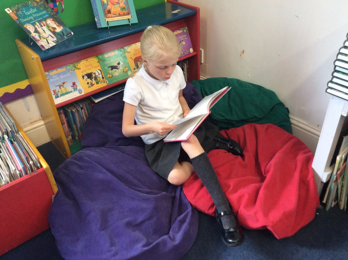 uplands_school's tweet photo. The library has been refreshed with new displays and, as you can see, the children are enjoying visiting to share books together. #aspiring https://t.co/beKcGWalEt