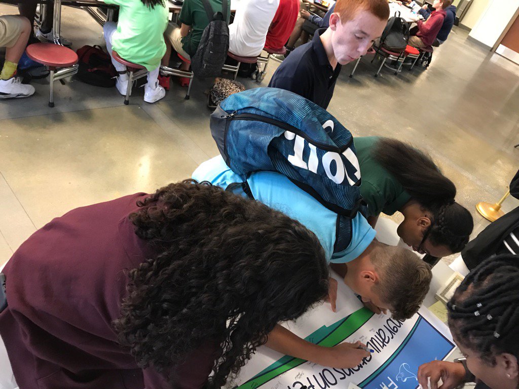 StormGroveFever's tweet photo. 8th graders take their turn with the perfect attendance banner! #180club  #sgfever https://t.co/DdsXNn1UBG