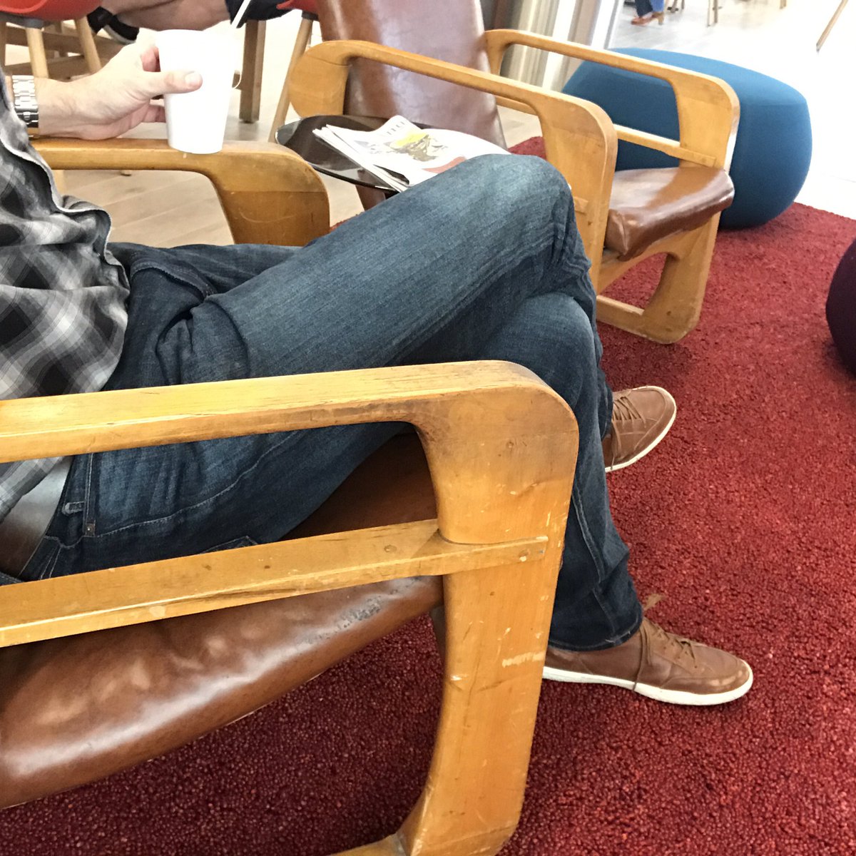 Creaturist's tweet image. Enjoying a morning tea in a Kem Weber-designed airline chair used in the original Disney Animation screening room.