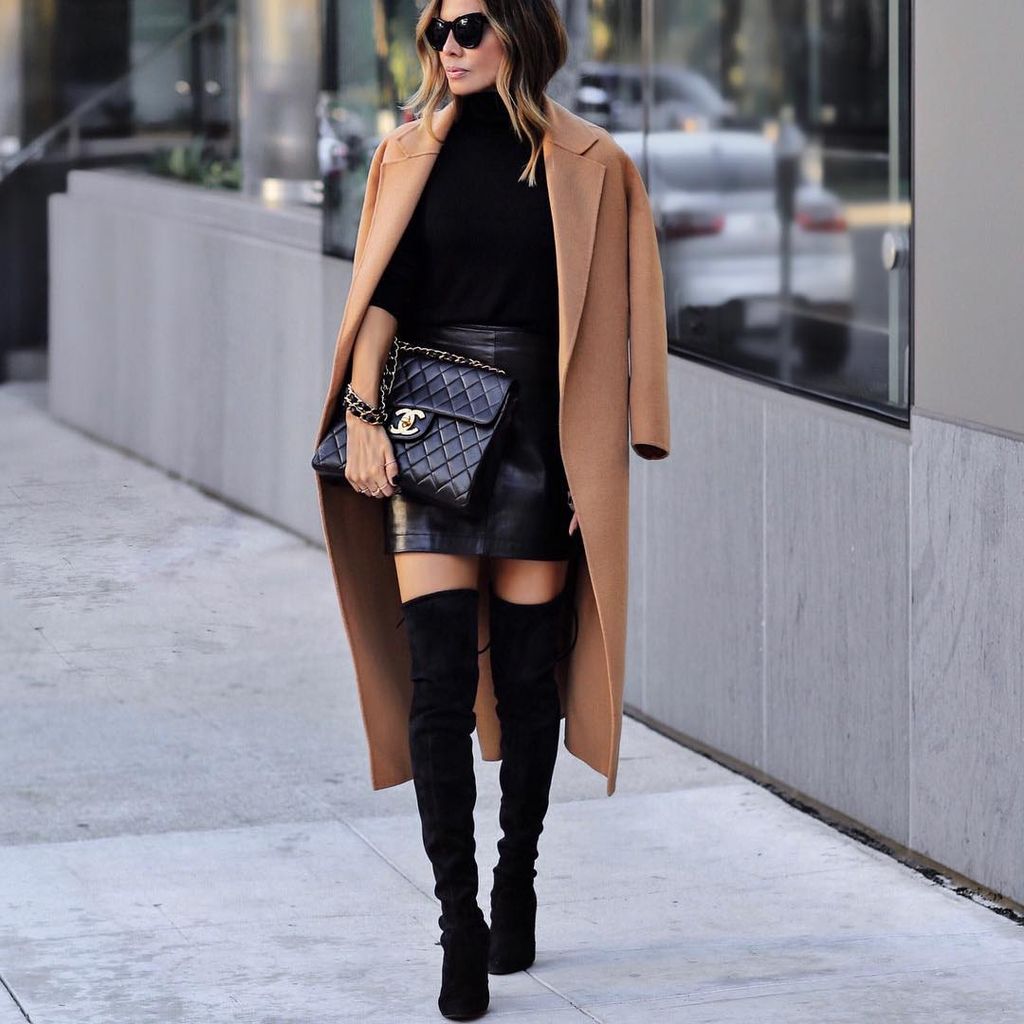 ChiclyApp's tweet photo. Black and tan perfection. Look on point with a camel, wool coat and high boots with a mini! 👏  📷 @lolariostyle #getchiclystyled #chiclyapp https://t.co/VC30QwOxJp