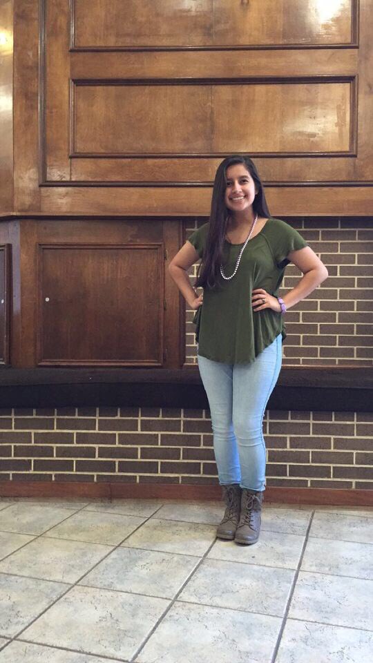 Jennifer rocking her Mardi Gras Beads! Loving the Homecoming Spirit! 💜🎭 #SFAHOCO17 #HOCO17_Genesis