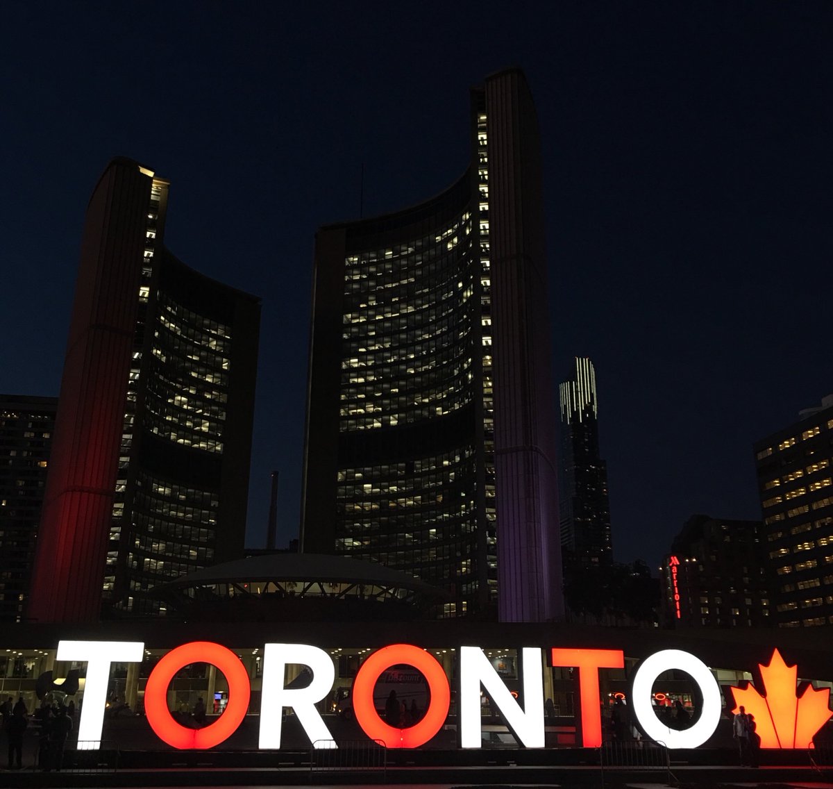 The Toronto sign is red and white tonight in memory of Gord Downie.