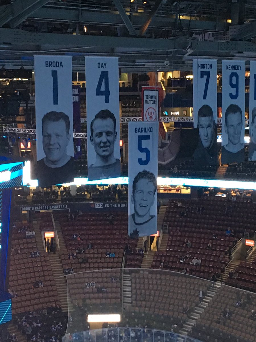 PixelOhne's tweet photo. In honour of the late Gord Downie and Fifty Mission Cap Bill Barilko’s banner is lowered from the rafters at the ACC #RIPGordDownie https://t.co/rtPkvA9WQX
